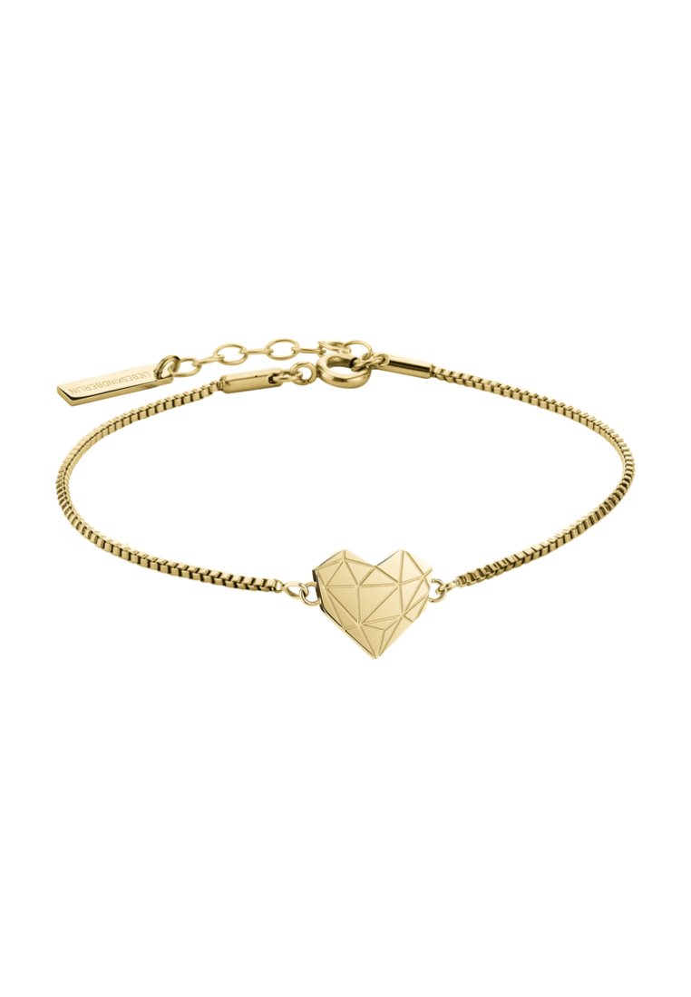 Złota bransoletka z sercem o szlifie. Łańcuszek jest smukły, o teksturowanym wzorze ogniw i bezpiecznym zapięciu. Zawiera zawieszkę z logo.