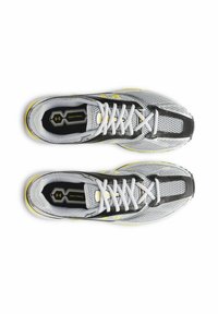 Modern athletic shoes featuring a breathable mesh upper in grey with black accents, yellow details, and a cushioned insole for comfort.