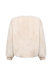 Crème-kleurige fuzzy sweatshirt met een zachte textuur, drop shoulders en geribbelde manchetten, met een ronde zoom en zonder zichtbare naden.