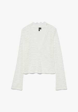 White, long-sleeve top made of textured lace with a V-neck and scalloped edges. Cropped fit with a soft, lightweight material.