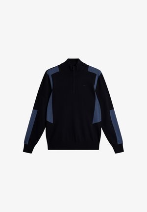 Czarny sweter z pół-zamkiem pod szyją. Posiada ciemnoniebieskie akcenty na ramionach i rękawach. Dzianinowa struktura, długie rękawy.