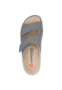 Gray slide sandal with two overlapping straps, soft suede-like material, cushioned insole, and contrasting white sole. Brand logo printed inside.