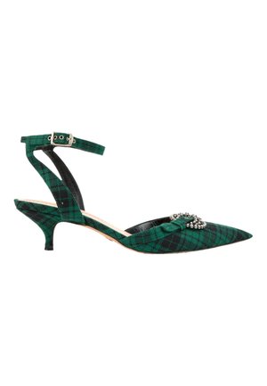 Escarpin à talon kitten pointu vert et noir à carreaux avec bride à la cheville et détail de boucle ornée de bijoux sur la pointe.
