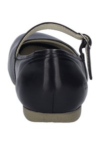 Ballerine en cuir noir avec un bout rond, une bride de cheville et une semelle en caoutchouc texturé. Finition lisse et design minimaliste.