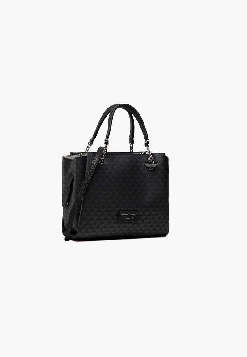 Black tote bag with textured nylon material, featuring dual handles, detachable shoulder strap, and a logo accent on the front.