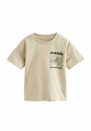 Beige Baumwoll-T-Shirt mit kurzen Ärmeln und Rundhalsausschnitt. Mit einem grafischen Druck, der den Text "oasis" und "BE HERE NOW" zeigt.