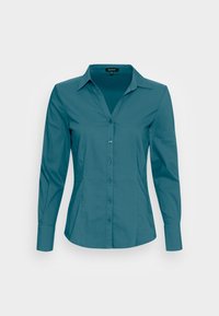 Camicia button-up di colore teal con colletto, maniche lunghe e silhouette aderente. Realizzata in tessuto morbido con una leggera lucentezza.