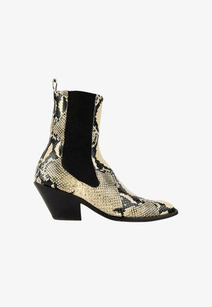 Khaite, Bottines de cowboy / motard - beige