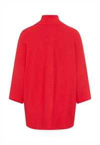 Rood geribd top met een hoge kraag, met een ontspannen pasvorm en driekwartmouwen. Geweven oppervlak met horizontale lijnen.