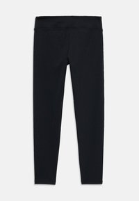 Leggings noirs avec une large ceinture extensible. Fabriqués à partir d'un tissu léger et lisse. Ils ont une silhouette slim et fuselée sans coutures visibles.