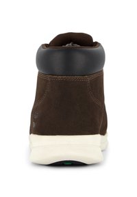 Brauner Wildleder-Stiefelette mit schwarzem Lederkragen, weißer Sohle und kontrastierender Naht. Verfügt über eine abgerundete Form und ein minimalistisches Design.