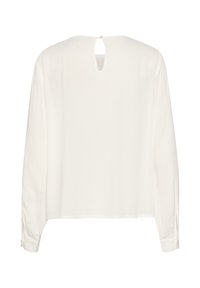 Blouse blanche à manches longues avec un détail dos en trou de serrure, texture douce, ourlet arrondi et poignets boutonnés. Design simple et classique.