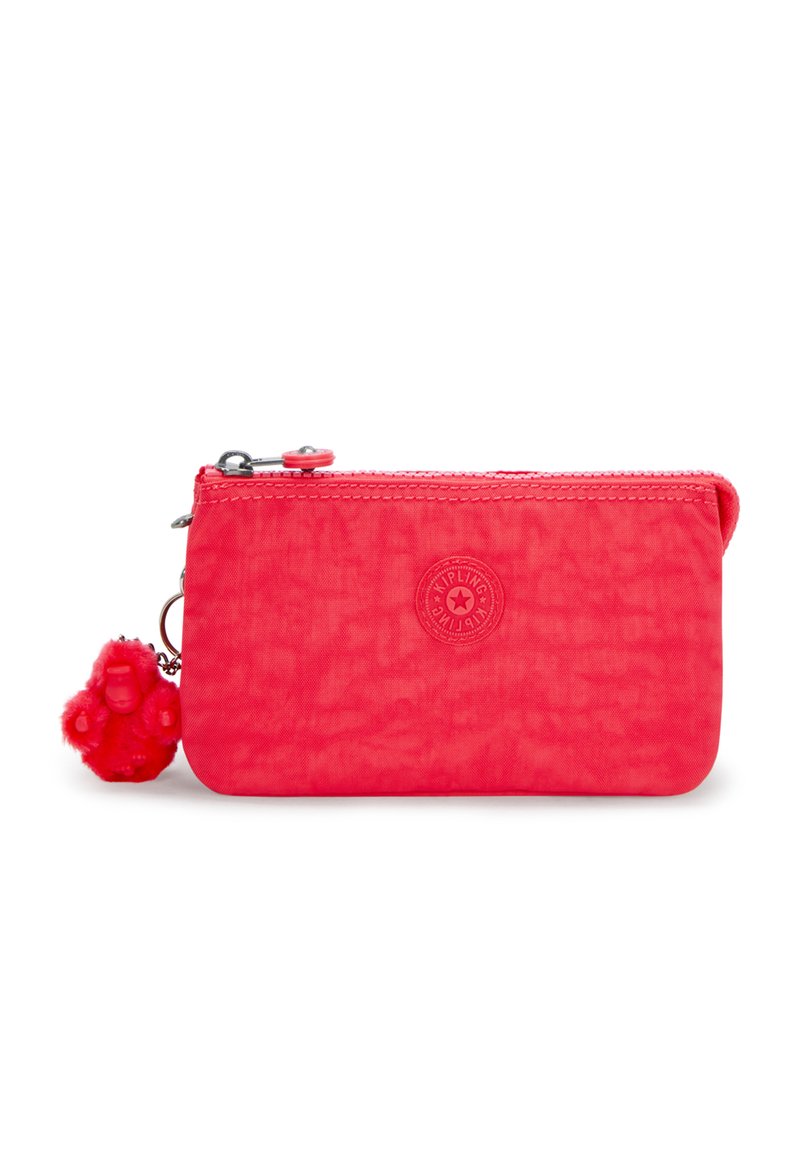 Rectangular pink wallet made of textured fabric, featuring a zipper closure and a red monkey keychain attachment. Logo embossed on front.