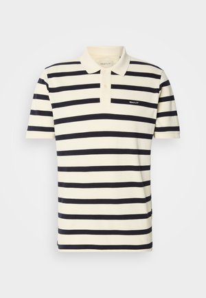 Striped polo shirt in cream and navy, made from cotton. Features a collar, two-button placket, and embroidered logo on the chest.