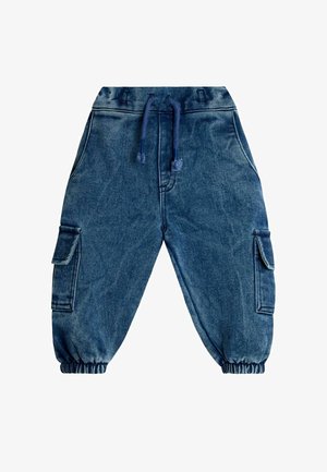 Džínové jogger kalhoty v tmavě modré barvě s elastickým pasem a šňůrkou. Obsahují dvě boční kapsy a elastické manžety na kotnících.