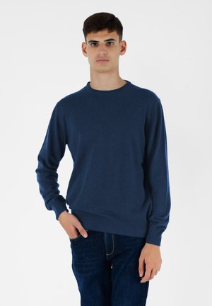 - Sweter