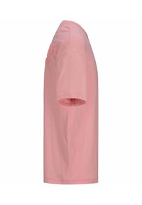 Camiseta de manga corta en algodón rosa claro con cuello redondo, que presenta texto bordado en la parte delantera y un diseño de corte recto.