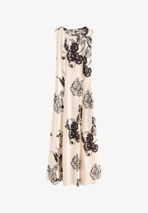 Ærmeløs lang beige kjole med stort sort og gråt blomsterprint, rund halsudskæring og flydende stof.