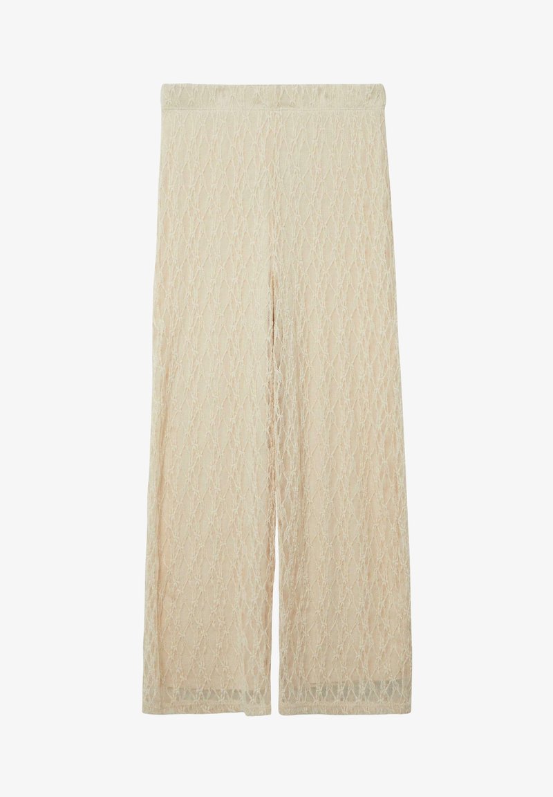 Pantalon beige léger, taille haute, avec motif diamant texturé et coupe large, présentant une légère brillance et une finition douce.