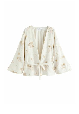 Krém színű, kimono stílusú kabát széles ujjakkal, virágos hímzéssel és elöl megkötős övvel.