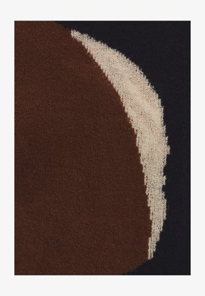 Tejido de punto con un diseño circular marrón bordeado por un fondo de color crema y azul marino. Textura suave con un contraste de color distintivo.