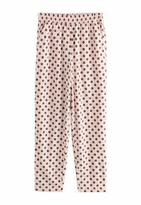 Pantalon rose clair à pois marron, taille élastique et poches latérales, posé à plat sur un fond blanc.