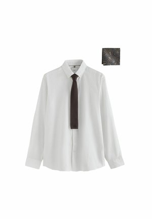 White long-sleeve button-up shirt with dark brown knitted tie and folded dark gray paisley pocket square on white background.
