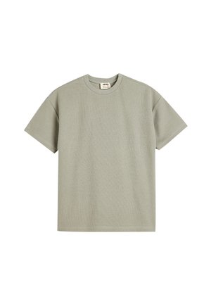 Lysegrøn kortærmet T-shirt lavet af tekstureret stof med rund halsudskæring og lige snit, med et lille mærke indeni.