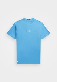 Light blue short-sleeve t-shirt made from cotton, featuring a round neckline and white embroidery reading "Polo Ralph Lauren" on the chest.