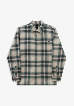 Košile na knoflíky z flanelové látky v krémové barvě se zeleným a námořnicky modrým károvaným vzorem; má náprsní kapsu a černé knoflíky.