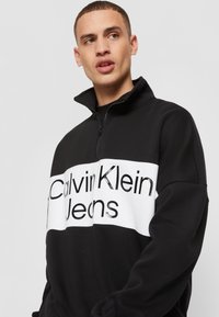 Calvin Klein Jeans BOLD LOGO COLORBLOCK ZIP UNISEX - Sweatshirt - black