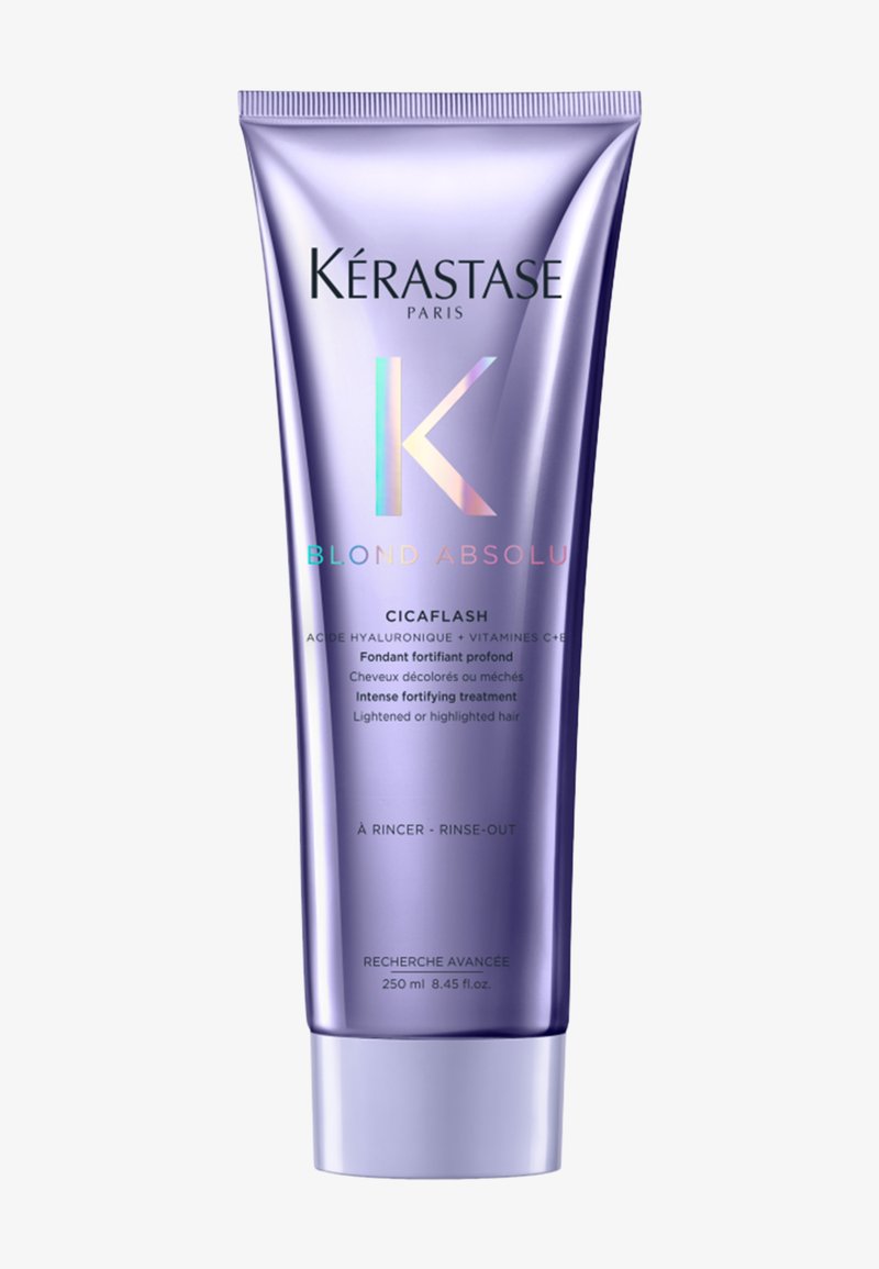 Kérastase Blond Absolu Cicaflash intensywna wzmacniająca kąpiel do spłukiwania do włosów rozjaśnianych lub pasemkowanych, 250 ml tubka w kolorze lawendy.