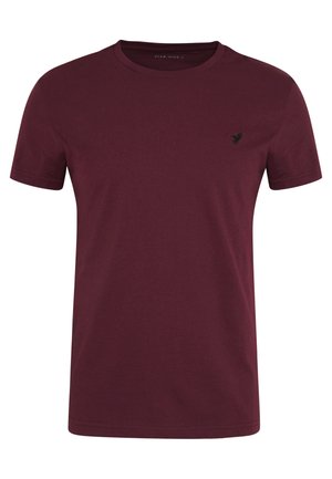 Camiseta burdeos de algodón, con cuello redondo, mangas cortas y un pequeño logo negro en el lado izquierdo del pecho. Textura suave, corte estándar.