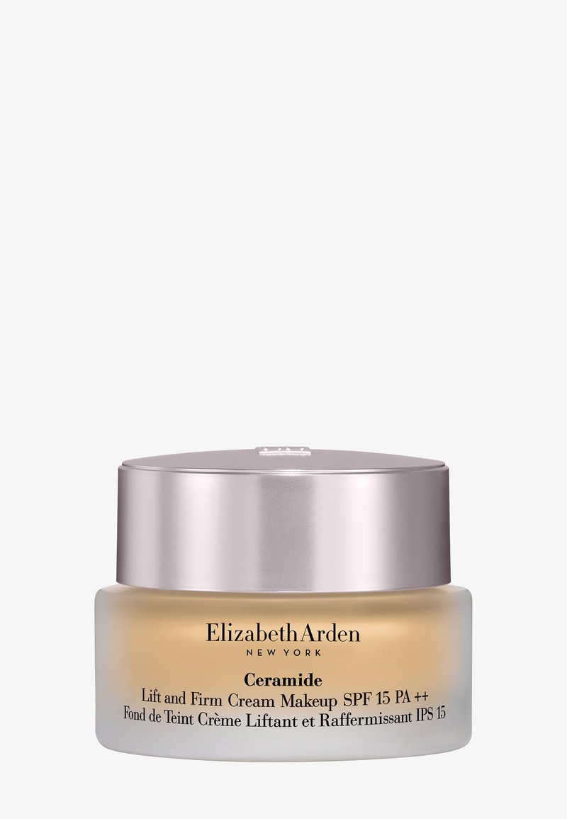 Barattolo di crema makeup Elizabeth Arden Ceramide Lift and Firm con SPF 15, vetro satinato e tappo metallico color oro rosa.