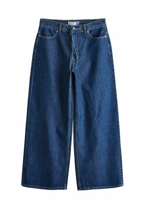 Szerokie niebieskie jeansy z denimu z przednimi kieszeniami, szlufkami na pasek, zapięciem na guzik i sznurkiem w talii.