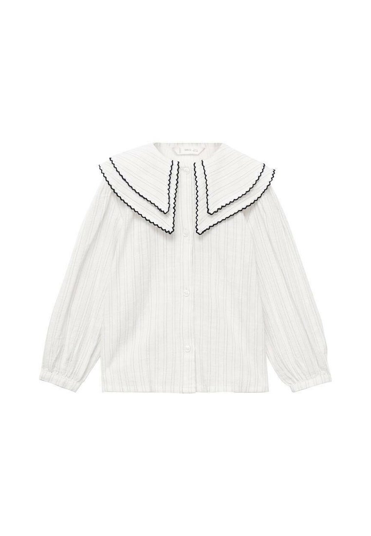 Bela prugasta bluzica s velikim, dvostrukim ovratnikom s crnim cik-cak rubovima. Duži rukavi s kopčanjem na dugmad sprijeda.