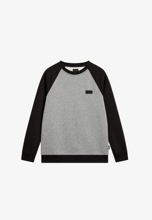 Sweatshirt gris et noir avec des manches raglan, en mélange de coton, avec un tissu texturé et une petite étiquette sur la poitrine portant le nom de la marque.