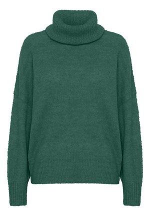 Pull à col roulé surdimensionné en teal, fabriqué en matière tricotée douce. Il présente des poignets et un col côtelés, avec une coupe décontractée et des coutures d'épaule abaissées.