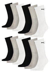 Schwarze, weiße und graue Baumwollsocken, knöchellang, mit gerippter Textur, versehen mit dem schwarzen Puma-Logo an der Seite, in zwei Reihen angeordnet.