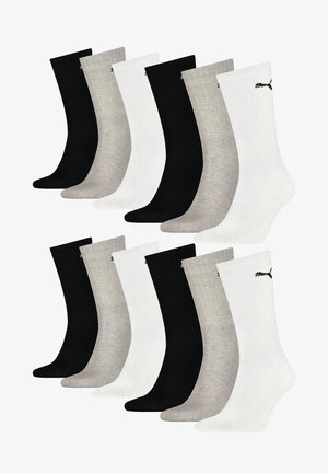 Black, white, and grey cotton socks, ankle-length, ribbed texture, featuring the Puma logo in black on the side, arranged in two rows.