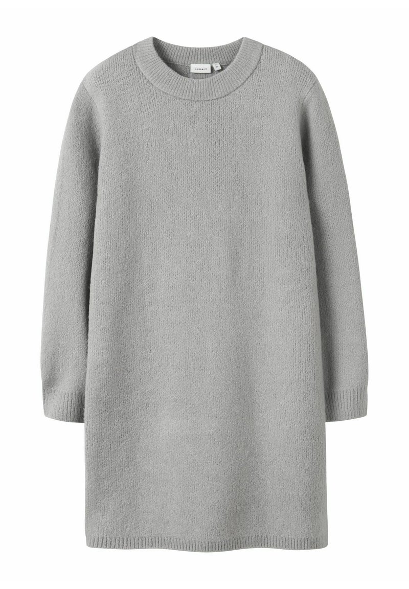 Vaaleanharmaa neulemekko, jossa on pyöreä kaula-aukko, pitkät hihat ja tekstuuripinta. Varustettu ribbineuleilla hihoissa ja helmassa. Yksinkertainen ja suora siluetti.
