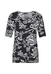 Zwarte korte mouwen top met een wit bloemenpatroon, ronde halslijn en zachte stof. Het ontwerp bevat verschillende bloemen- en bladmotieven.