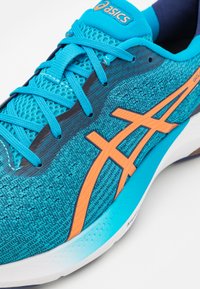 ASICS GEL-PULSE 14 - Scarpe da corsa su strada - island blue/sun peach