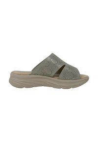 Sandali slip-on grigi chiari con motivi floreali intagliati al laser, soletta imbottita e una spessa suola beige con texture a onde.