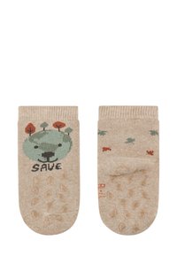 Beige Baumwollsocken mit einem grünen Tiergesicht und dem Text "SAVE", akzentuiert mit buntem Laub und einer rutschfesten, strukturierten Sohle.