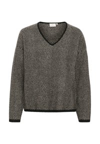 Pulover tricotat în zigzag alb-negru cu decolteu în V, umeri lăsați și tiv ribat. Material texturat cu decolteu și manșete negre în contrast.