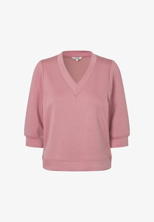 Ružová blúzka s výstrihom do V, balónovými rukávmi po lakte a priliehavým pásom, vyrobená z hladkej ľahkej látky.
