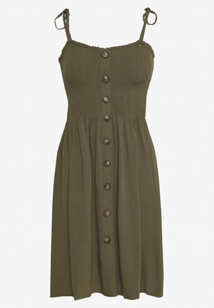 Olijfgroene mouwloze jurk met knopen aan de voorkant, een geplooide taille, een gerimpelde lijfje en strikbandjes.