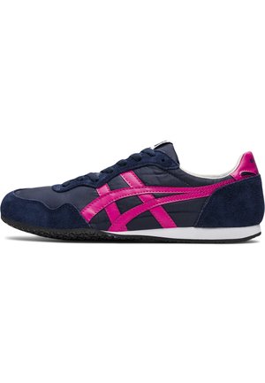 Navy blue athletic shoe with pink accents and suede heel. Features a textured rubber sole and textured fabric upper with lace closure.