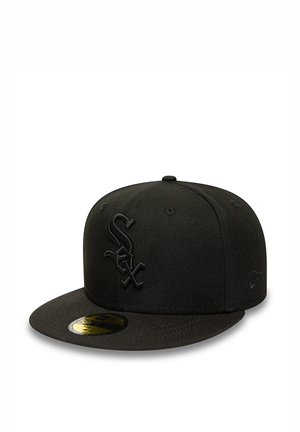 Black fitted baseball cap with flat brim, featuring raised black "Sox" logo on front and size sticker on the brim.